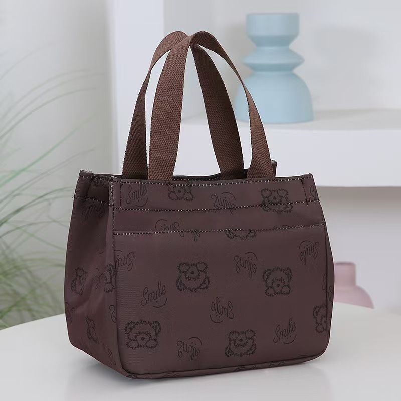 The New Cartoon-printed Handbag Is A Large-capacity Shoulder Bag, Trendy And Fashionable. It Is Also A Briefcase for Office Workers. It Is The Top-Quality Product On The Entire Online Market.