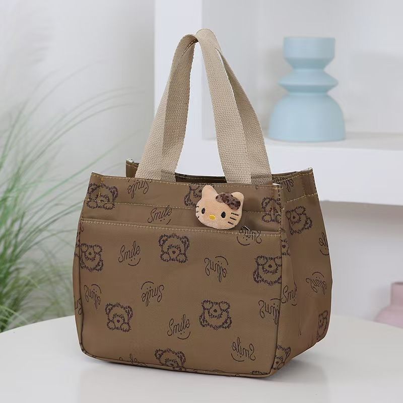 The New Cartoon-printed Handbag Is A Large-capacity Shoulder Bag, Trendy And Fashionable. It Is Also A Briefcase for Office Workers. It Is The Top-Quality Product On The Entire Online Market.