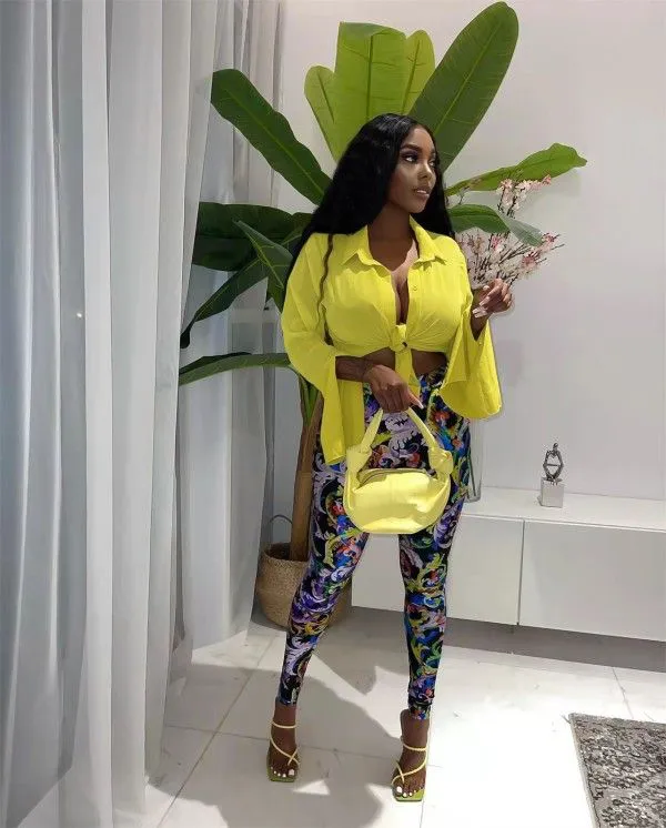 A Two-Piece Set Of Fashionable Long-Sleeved Shirt And Printed Trousers For Ladies