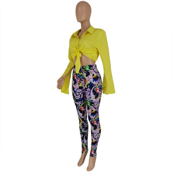 A Two-Piece Set Of Fashionable Long-Sleeved Shirt And Printed Trousers For Ladies