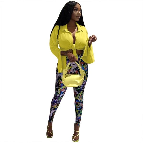 A Two-Piece Set Of Fashionable Long-Sleeved Shirt And Printed Trousers For Ladies