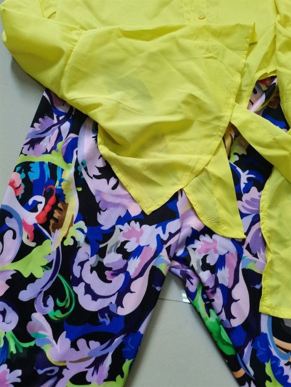 A Two-Piece Set Of Fashionable Long-Sleeved Shirt And Printed Trousers For Ladies