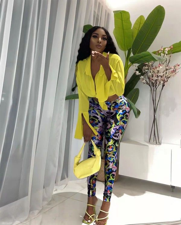 A Two-Piece Set Of Fashionable Long-Sleeved Shirt And Printed Trousers For Ladies