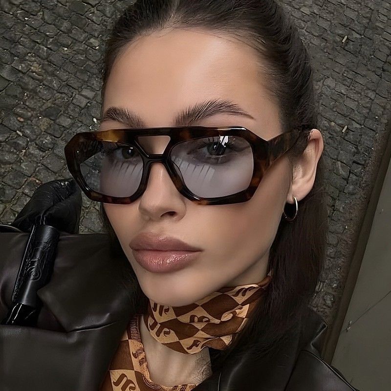 Fashion Europe and the United States double beam irregular sunglasses ladies big frame Instagram personality wear with glasses leopard print street shot sunglasses
