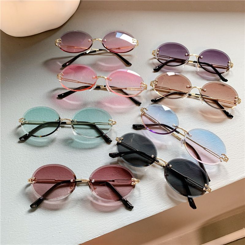 2025 New sunglasses Ladies oval net red gradient dark glasses personality rimless cut edge trend glasses