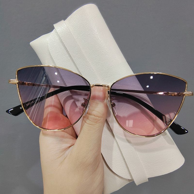 New hot metal small frame cat-eye sunglasses ladies fashion Europe and the United States street shot sunglasses