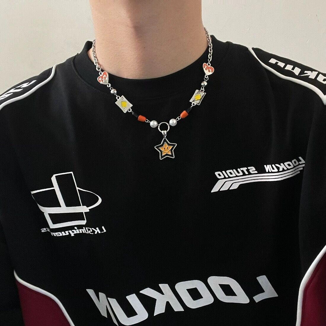 An ins national trend smiling lucky star patchwork necklace for men and women, a hip-hop high-end style collarbone chain hoodie accessory necklace