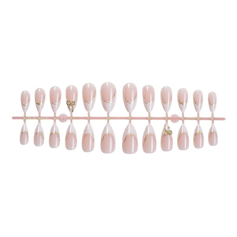A detachable and wearable nail plate set for ladies with exquisite French bow, almond gold edge lines and delicate nail art