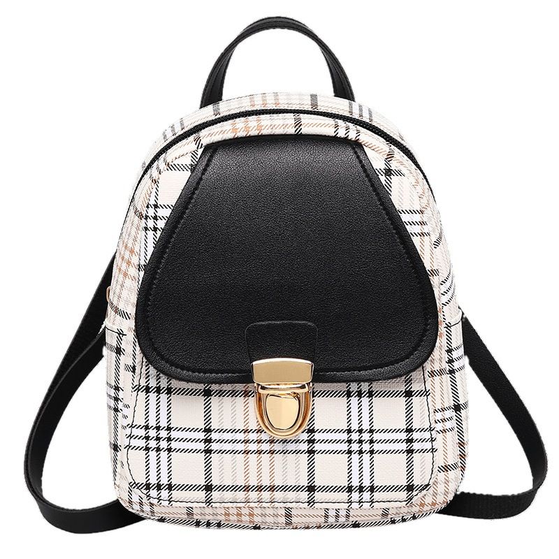 The new checkered backpack is a trendy Korean-style bag. It's a small hand-held bag with a lock and a single-shoulder crossbody bag for students. It's fashionable and versatile
