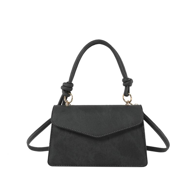 A new versatile solid color trendy and fashionable hand-held small square bag, a simple and individual single-shoulder crossbody bag
