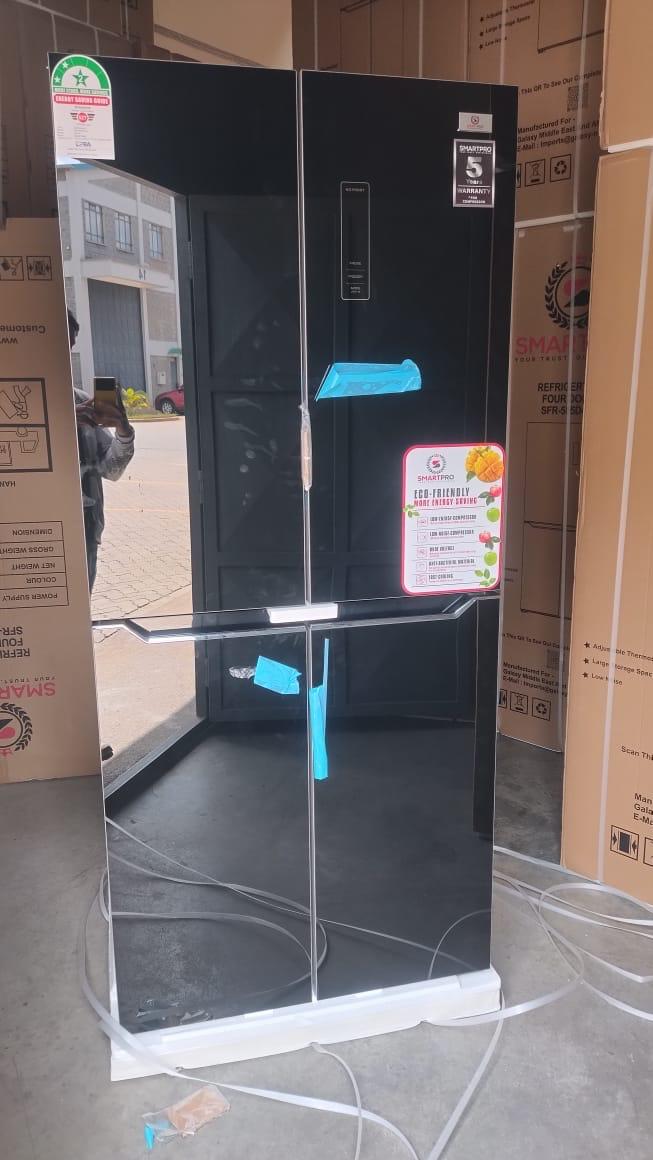 450 LITRES SMART PRO FOUR DOOR GLASS BOX INOX NO FROST REFRIGERATOR - Odor-Free Freshness – Built-in deodorizer, Energy Saving – Eco Mode reduces bills.