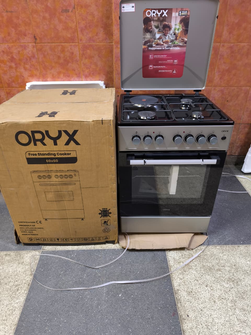 Mika ORYX 60cm x 60cm, 3 Gas Pool Jet Burners + 1 RAPID Hot Plate Standing Cooker , Button Ignition, 3 Function Electric Oven, Black Hob, Silver Body