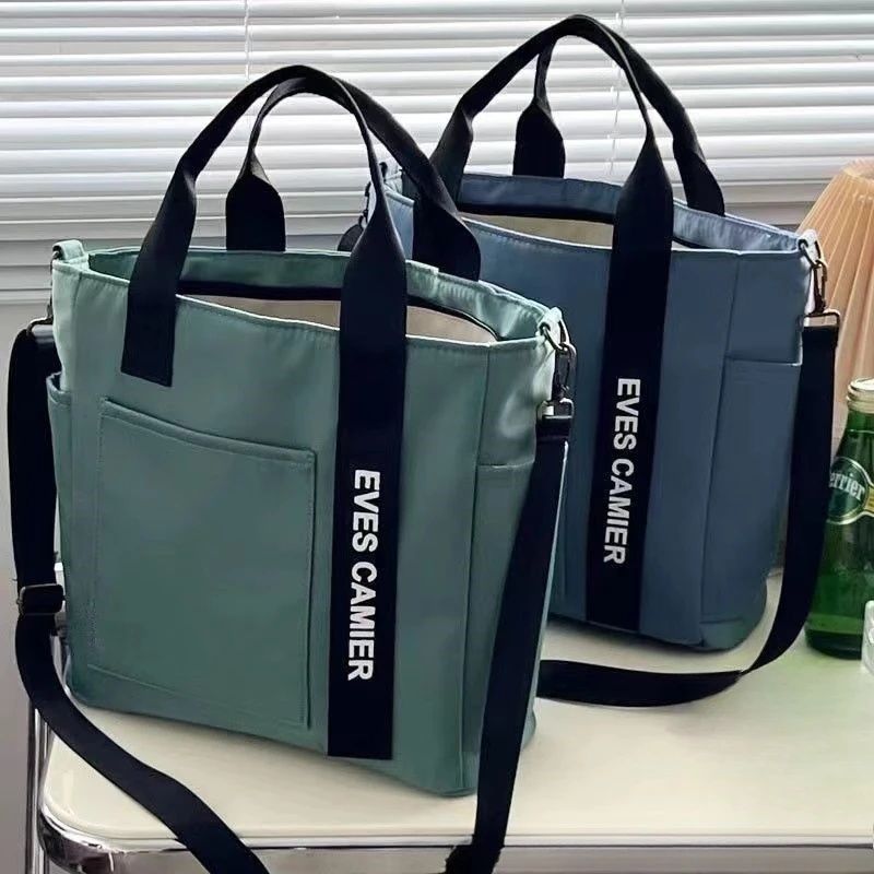 New Design Waterproond Stylish  Canvas Tote  Simple Versatile Shoulder, Portable Lunch Box Bag ,Durable Adjustable Strap   Multi-pocket  Travel Bag Student Purses