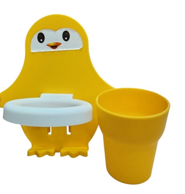 PENGUIN TOOTHPASTE AND TOOTHBRUSH HOLDER WITH CUP, STICKS WITH ADHESIVE STICKER A delightful penguin design that appeals to both children and adults