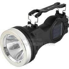 KC Rechargeable Torch – Multi-Functional Solar-Powered LED Light with Dual Spotlight and Lamp Modes, Ultra-Bright Illumination, Compact Design, and Durable Build for Indoor and Outdoor Use.