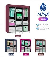 3 Columns Wardrobe – Spacious Multi-Section Storage Closet with Hanging Rods & Shelves, Available in Wood, Metal & Portable Fabric Options for Bedroom Organization