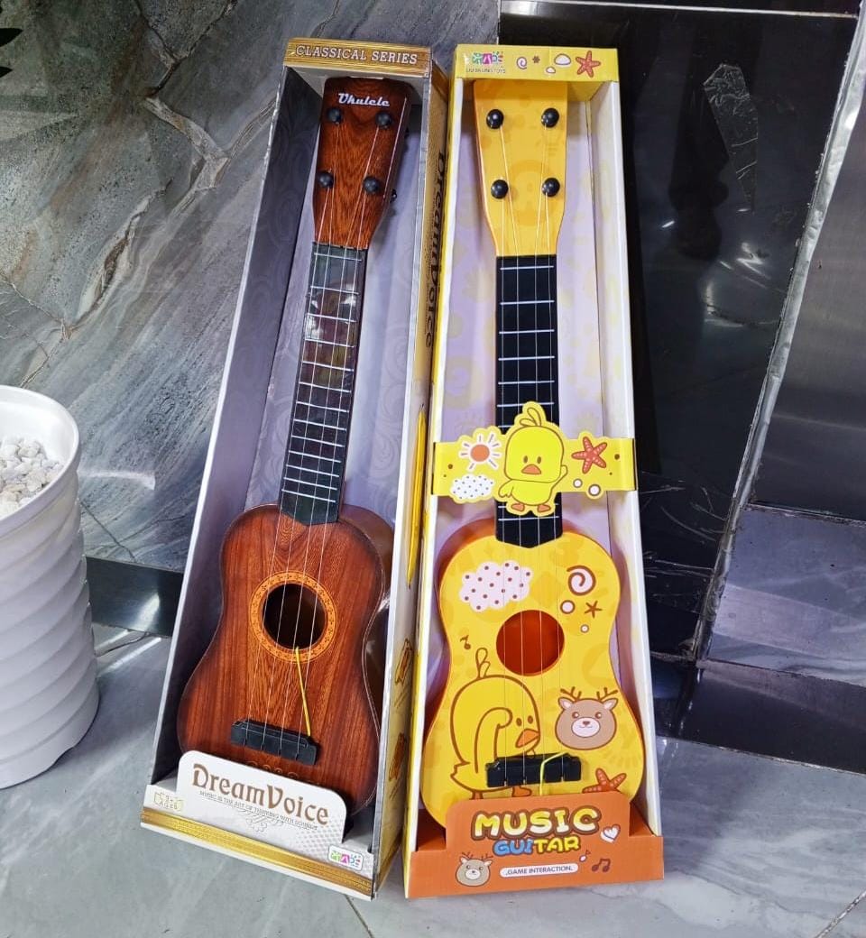 [ GRAB IT AT LOW PRICE+ ADDED OFFERS 🤩🤩✨ !!! ] 1 Pc Classy Brand New Very High Quality Stylish and Luxurious Kids Music guitar  at Affordable Price .Designed With Durability and Functionality ✨👌