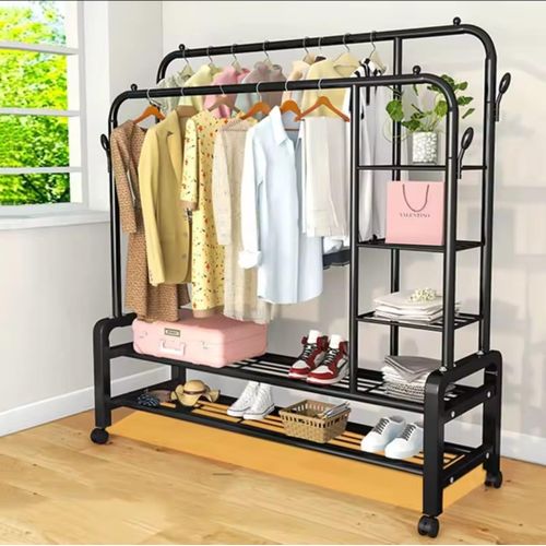 Double Pole Cloth Rack With Lower And Side Storage For Shoe And Boxes. Has Wheels.