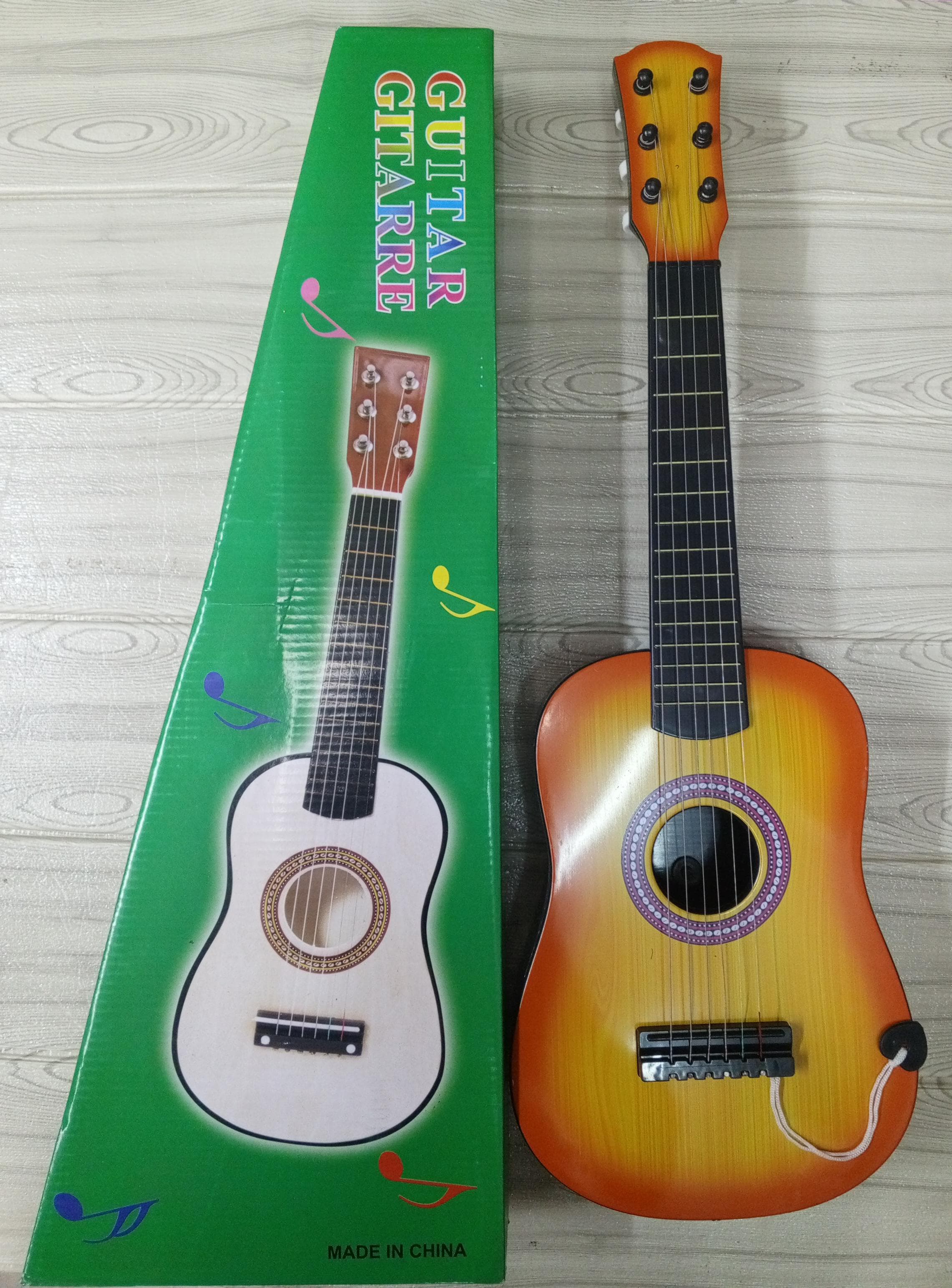 🤑🥑**HOT DEALS 🔥 🥑🌽ONLY AT KILIMALL !!! **🥑1Pc Brand New Very Quality & Stylish Kids ➡️ Musical guitar ➡️ 6 strings➡️ Size 23 inch..At Affordable Price