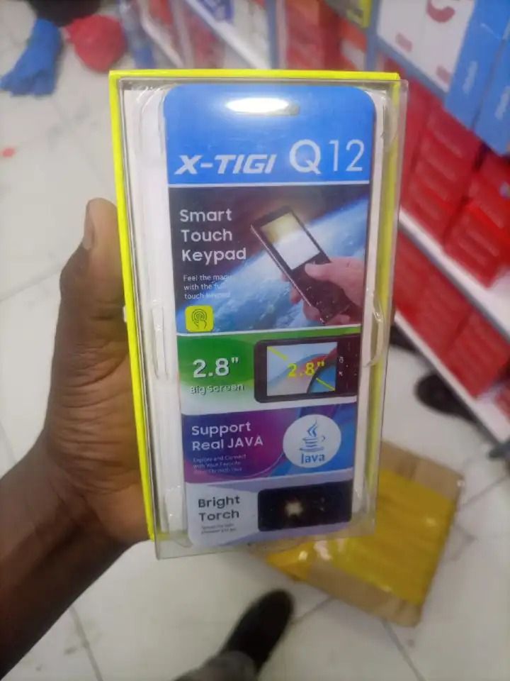 BRAND NEW X-TIGI Q12, 2.8" SCREEN SIZE WITH 1.3 MP CAMERA, 1500mAh BATTERY, SUPPORTS WIRELESS FM AND FLASHLIGHT, DUAL SIM FEATURED PHONE