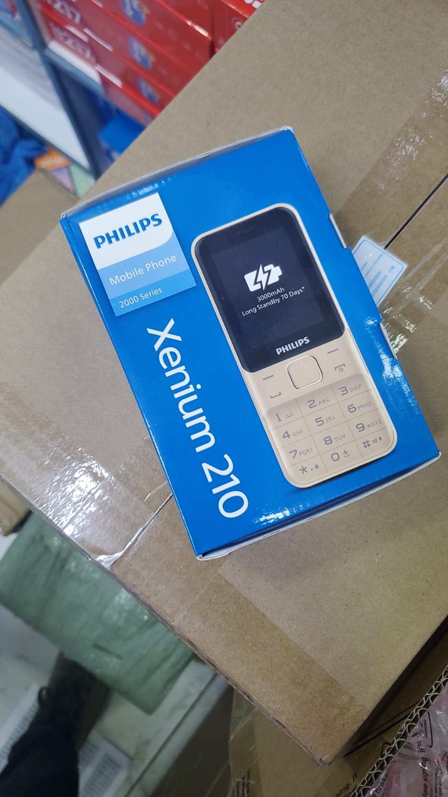 Philips xenium 210 3000mAh battery type c charger 2.4 inches screen size 3 sim cards 3.15 mp camera featured phone