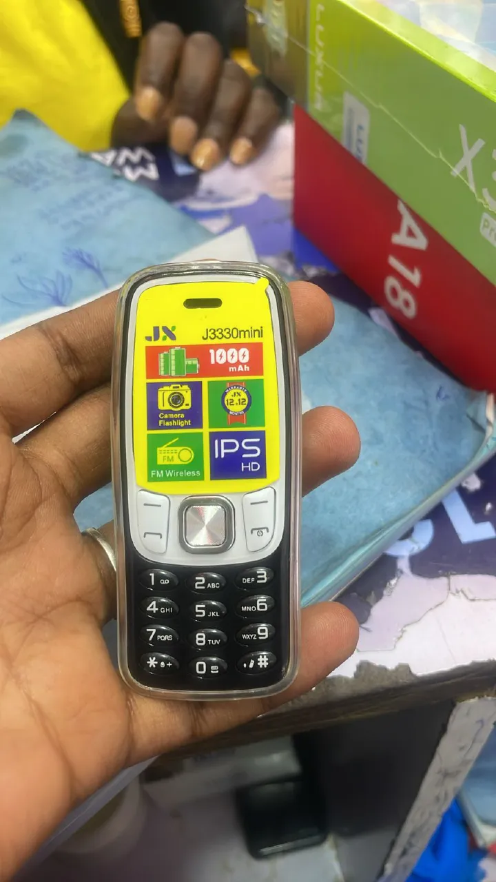 Jx J3330 mini phone 1.3" Screen Kabambe Wireless FM Camera,Bright Touch,Facebook,1000mAh Dual Sim featured phones