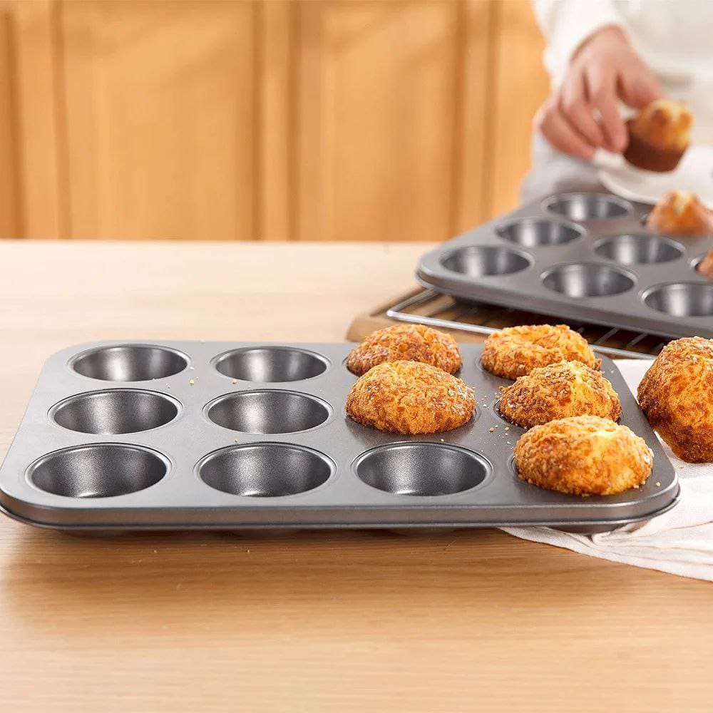 *12 holes cupcake baking tins 
🔅 Bakes 12pcs cupcake 
🔅Non-slip 
🔅made of carbon steel and durable material
🔅Multi-function cupcake pan for Making Muffin Cakes, Chocolate, Bread, Mousse, Jelly, Br