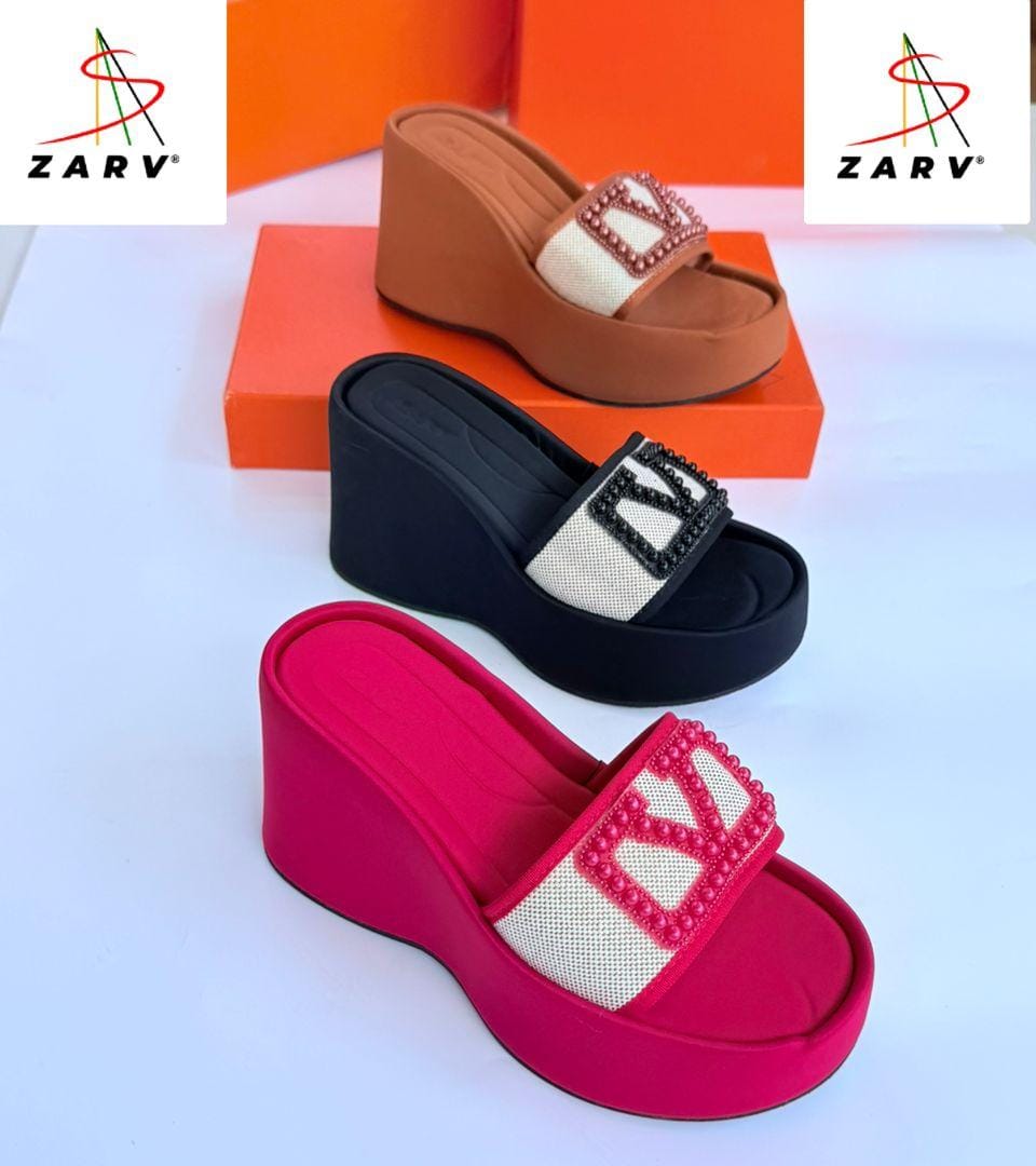 *_🔥Platforms Sandals. It Gives a striking and modern  appearance. A Cushioned  footbed for comfort. A white mesh panel adorned with beads embellishments💥_*
Available in :Black,Brown,and Red