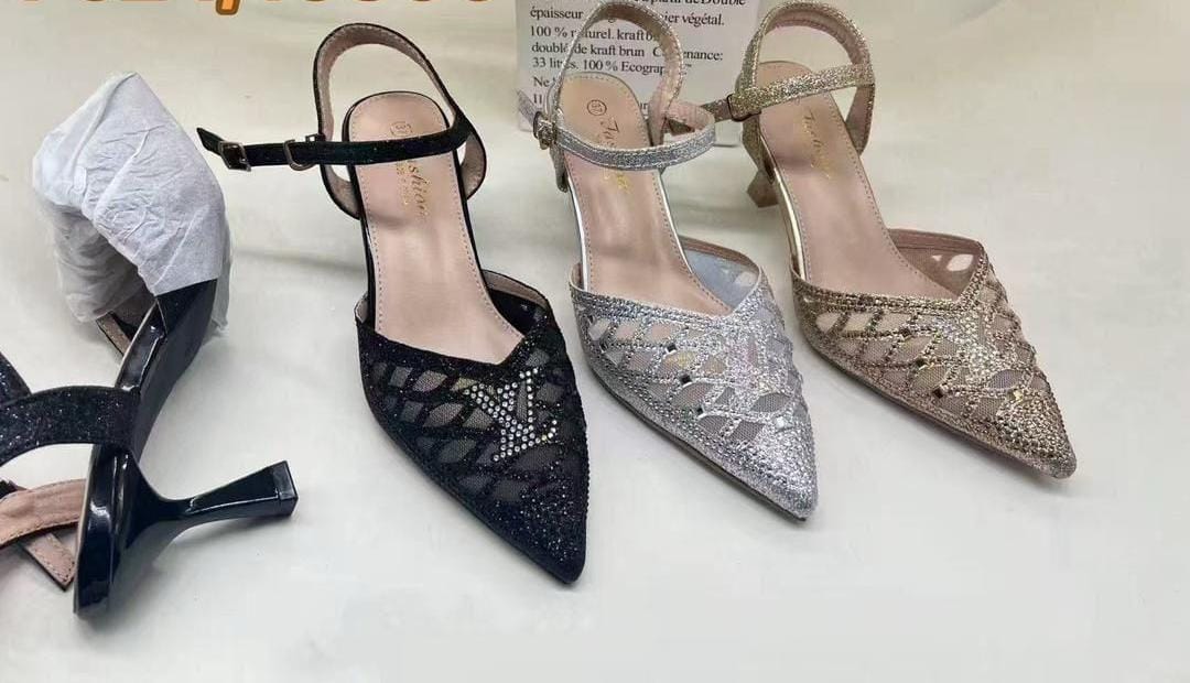 *_💥A Sheer mesh Material  adorned  with  Glittering  Rhinestone, including (LV) louis vuitton. Overall Style  Combines Glamour  and Sophistication💥_*
Available in:Black, White, and Gold