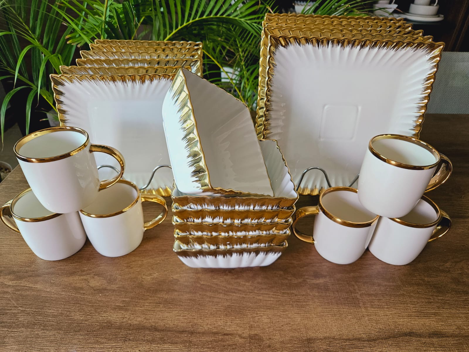 24 Pcs Ceramic Classy Dinner Set With Gold Rim - Perfect for serving main courses and entrees, these dinner plates provide ample space for showcasing your culinary creations.