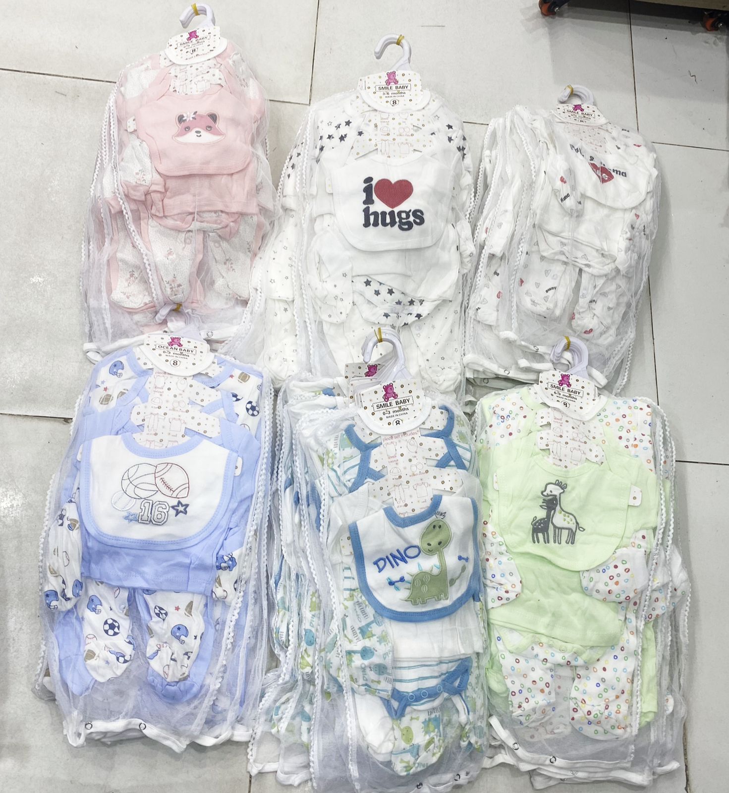 BABY RECEIVING SET. 8 Pieces Cotton Receiving Set - Made from high-quality, breathable cotton, this set is gentle on your baby’s delicate skin, ensuring all-day comfort.