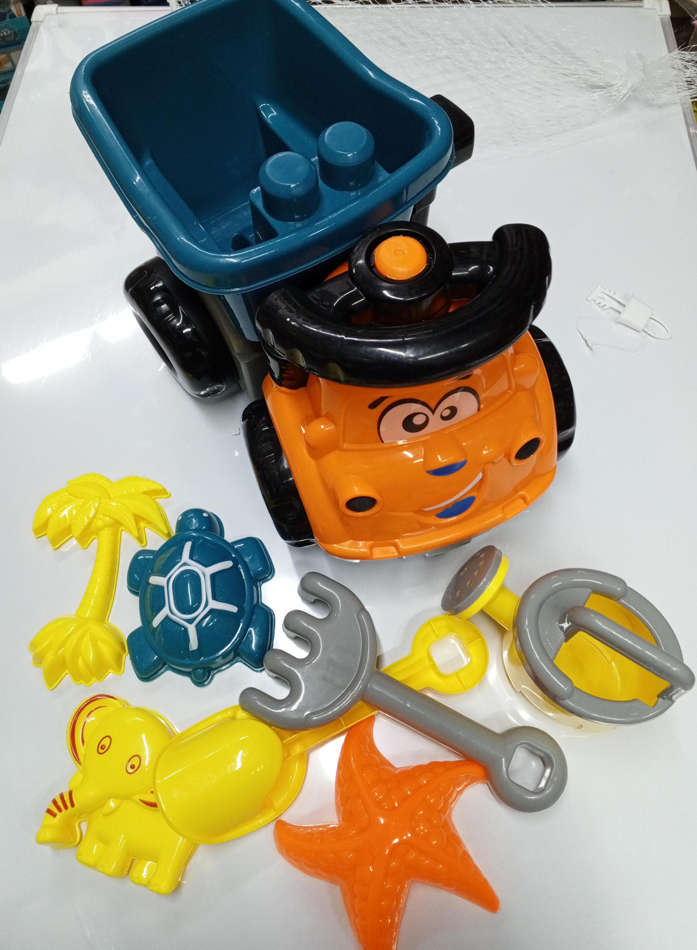 Beach Truck Toy With  Fun Accessories - Beach truck design, perfect for sand play, Comes with fun beach toys – shovels, molds, and more, Durable and safe for kids.
