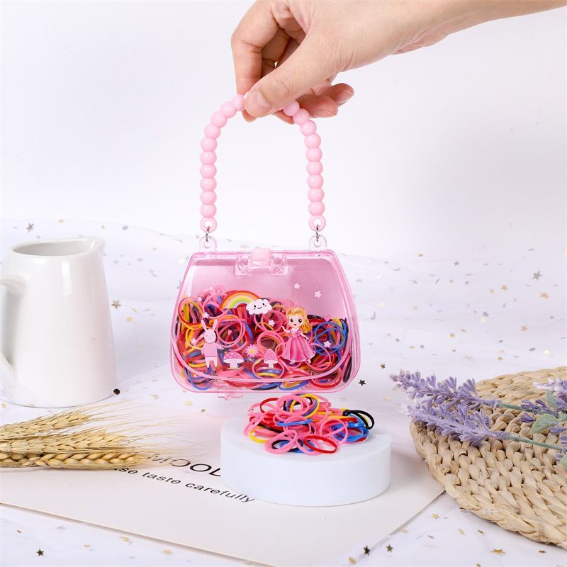 Hot selling candy colored hair loop, cute girl heart pink handbag disposable hair rope, personalized rubber bands for children's hair accessories, no harm to hair small rubber bands