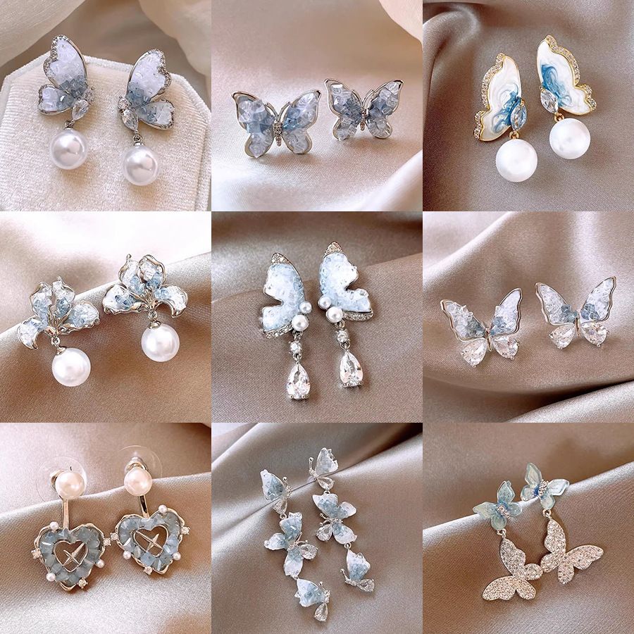 New silver needle blue crystal butterfly earrings, high-class light luxury earrings for small audience, Korean fashionable popular earrings for women, simple and elegant, fashionable and versatile