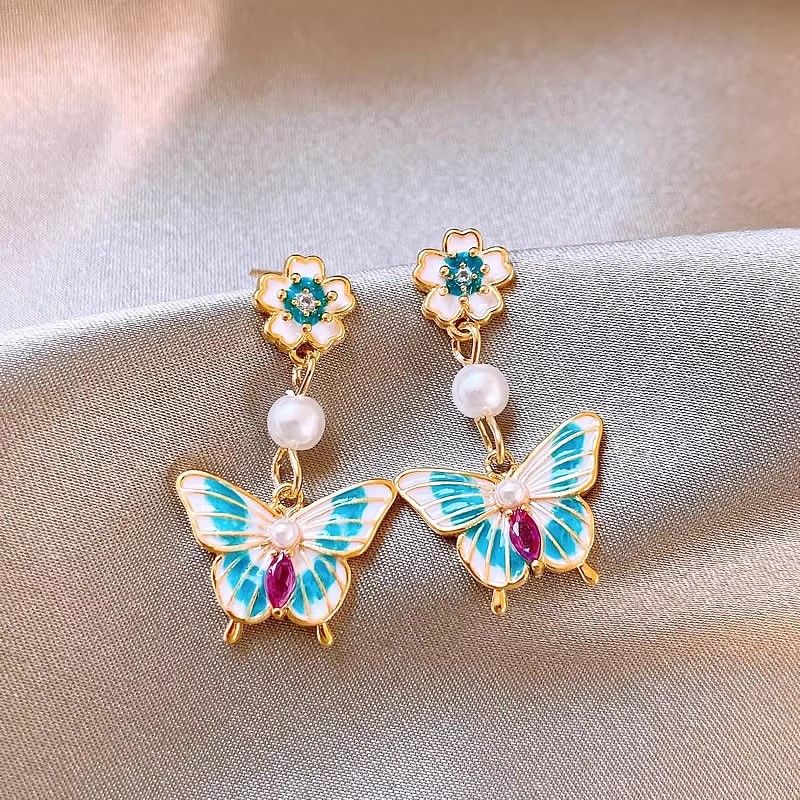 New silver needle blue crystal butterfly earrings, high-class light luxury earrings for small audience, Korean fashionable popular earrings for women, simple and elegant, fashionable and versatile