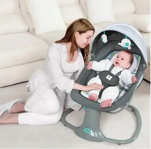 Electric Baby Swing Remote controlled with 3-in-1 function: Rocker, sleeper, bassinet. Reclines. 5-speed variation