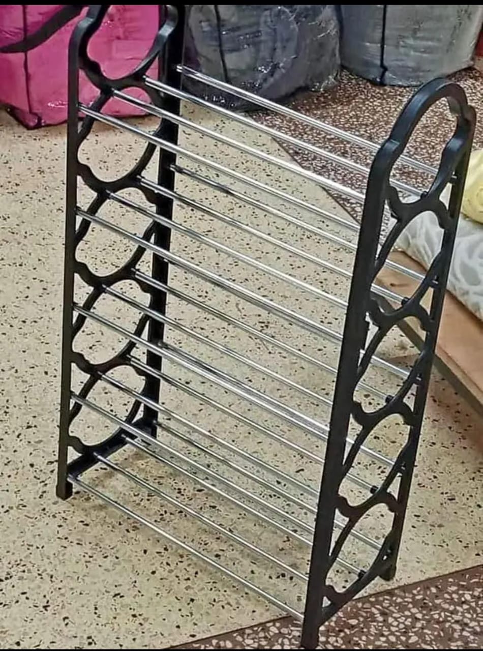 5 Layers Simple Amazing Shoe Rack  These racks are made of strong metal pipes and plastic pars and hold the weight of 15 shoes. Helps save space, get more organized and even help you protect your sho