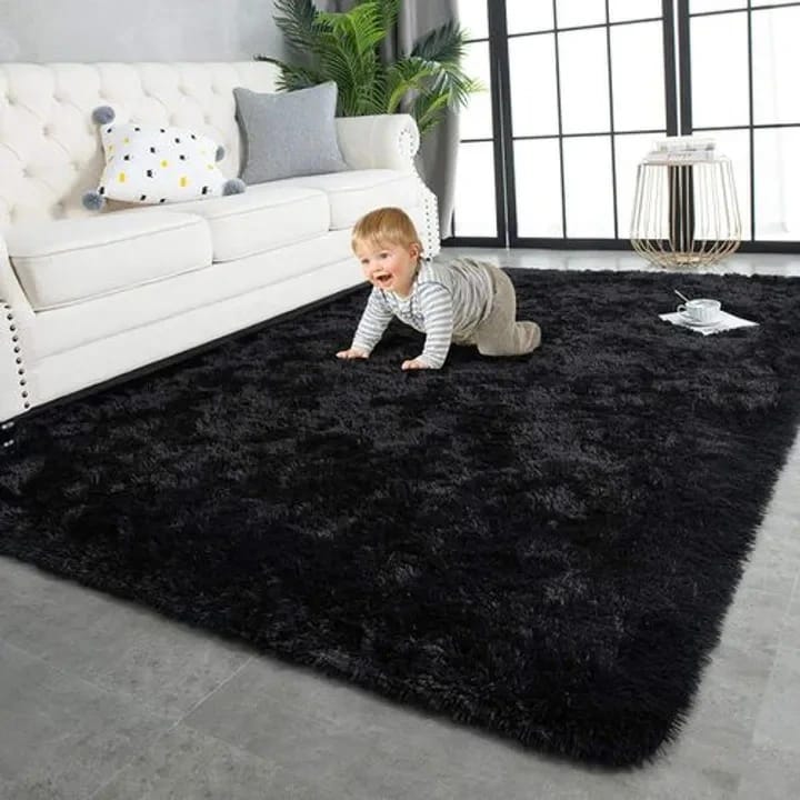 Luxurious Soft Fluffy Carpet This woolen shag rug in cotton material and a thick surface is the ideal carpet for your home that will give you value for your money. It is very soft for a warm and cozy