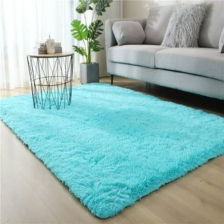 Luxurious Soft Fluffy Carpet This woolen shag rug in cotton material and a thick surface is the ideal carpet for your home that will give you value for your money. It is very soft for a warm and cozy