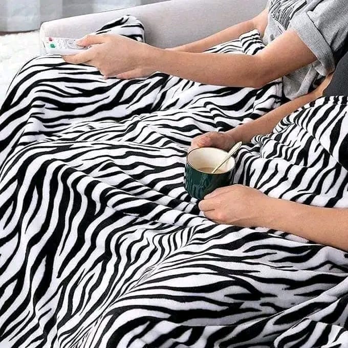 Coral fleece throw blankets  Easy to care
Machine wash friendly 
Unique design philosophy 
Soft in both sides 
Versatile as it can be used in bed, living room and in your car 
Innovative 
Durable