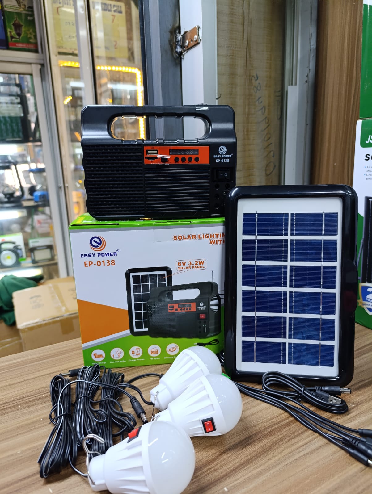 📍🤑*Easy Power Solar Lighting System with Speaker.* * 6v 3.2 W Solar Panel. * EP-0138 * 3 Light Bulbs. * Charge phones. * FM radio. * BT speaker. * Battery: 3.7v 3600MAh lithium. * Led Work Time✨️🍂