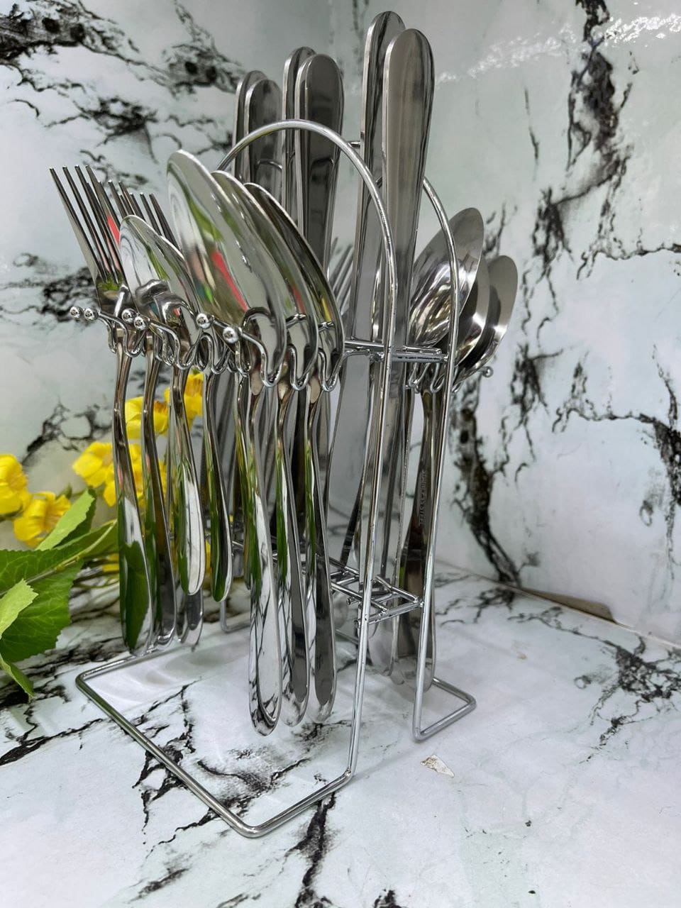 24 Pcs Stainless Steel Cutlery Set +Stand  24 Pieces plain stainless steel cutlery set bring a classy touch to your dinner table. we specialized at improving your home and kitchen ideas. We pride ours