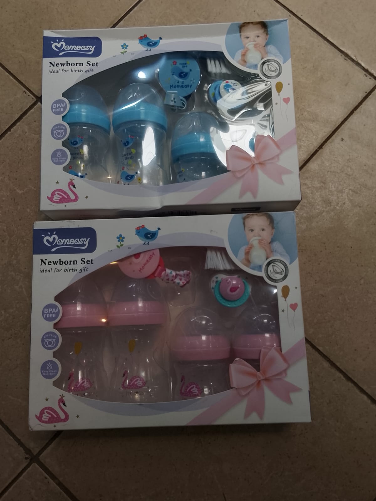 4 pcs bottles, Pacifier  This thoughtfully curated set includes high-quality, BPA-free feeding bottles designed for easy grip, a soft silicone pacifier to soothe your baby, and gentle cleaning brushes