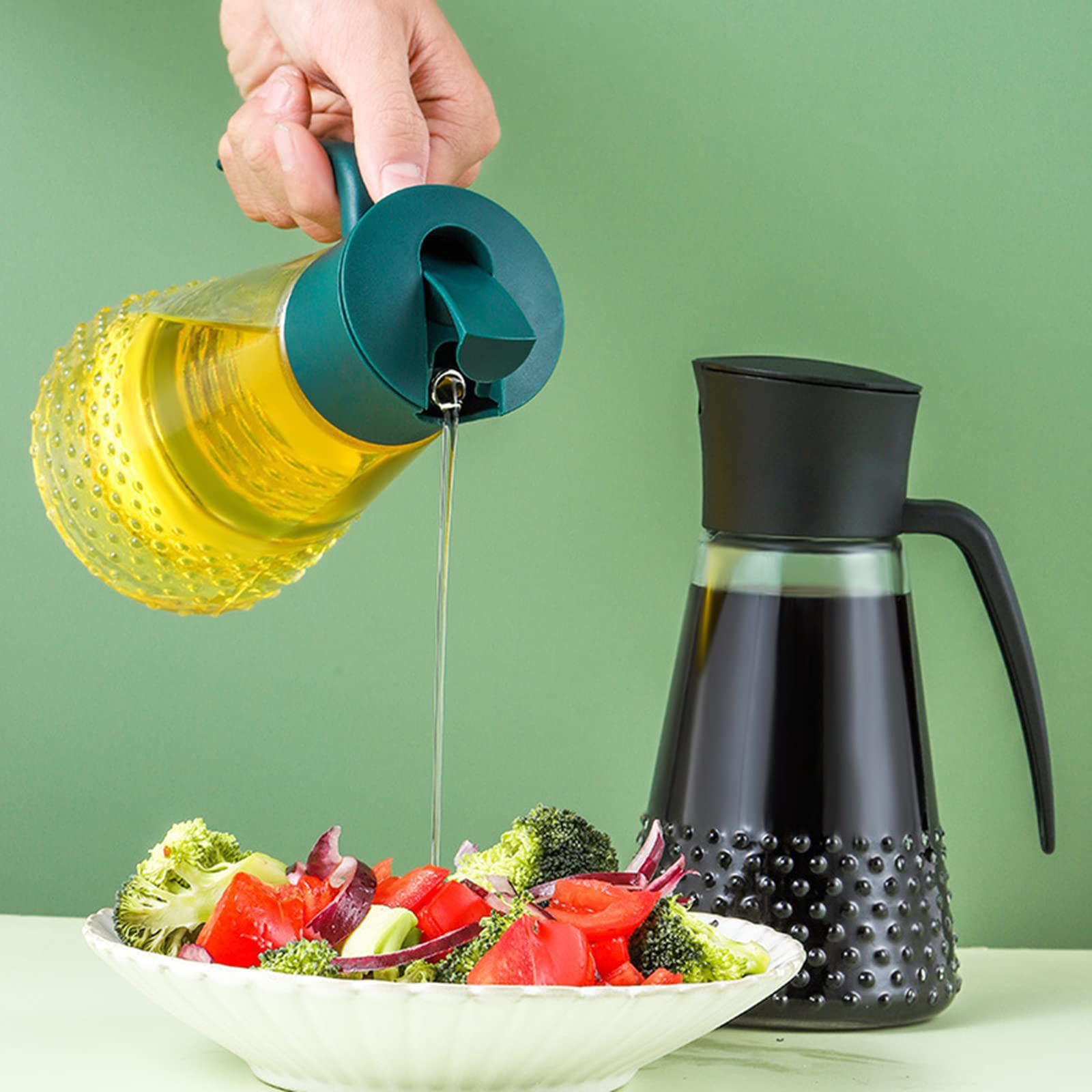 Oil Jar Bottle-630ML   Made of food grade BPA free and lead-free glass, this oil bottle is well built to last. The pear shaped glass bottle is thick and sturdy, with silicone sealed gasket inside the