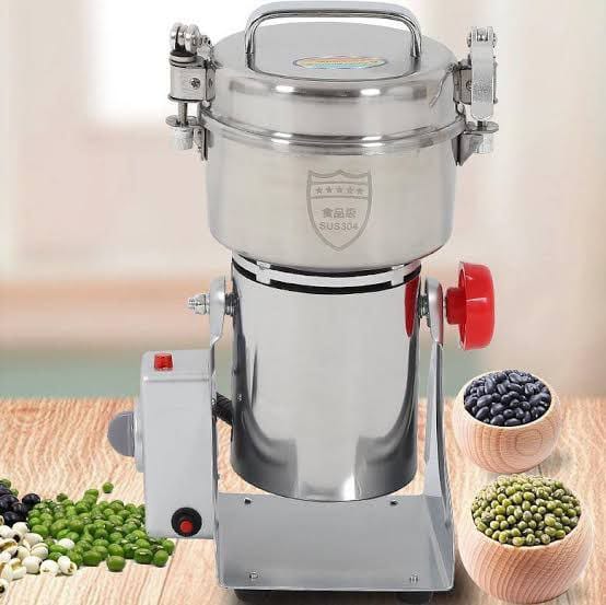grinding machine Effortlessly grind your coffee beans, spices, and grains with this powerful electric grinder. Designed for quick and efficient operation, it features a sturdy stainless steel bowl and