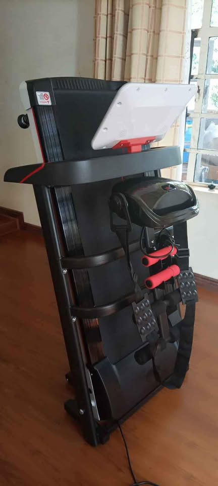 Fold-able Treadmill with a Massager and 2 Dumbbells - Suitable for both home and commercial use. High quality standard