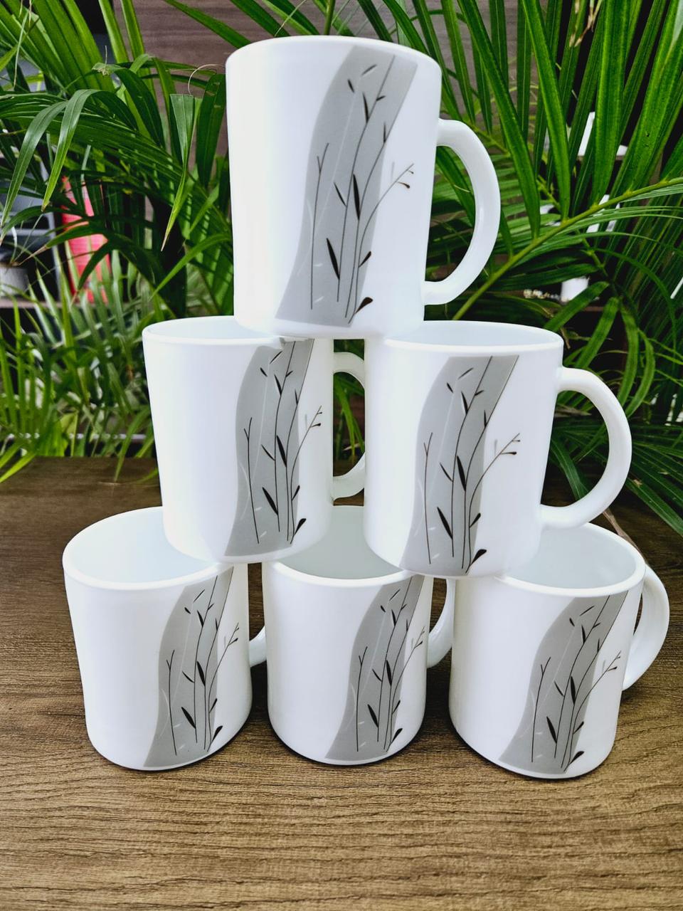 ☕✨ PureWhite Elegance Ceramic Mug Set (6-Piece) | Modern Prints • Durable • Everyday Luxury ✨☕ Bring calm, class, and character to every sip with this Premium White Ceramic Mug Set, featuring three e