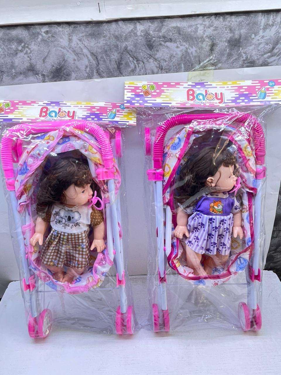 New🔥 🔥 🔥 🔥 Doll plus A Stroller🔥 🔥 🔥 🔥
30cm doll
52cm Stroller
Comes with Toilet  Training Potty, Diaper and Feeding Bottle
The doll is able to drink 
The doll makes crying Soounds