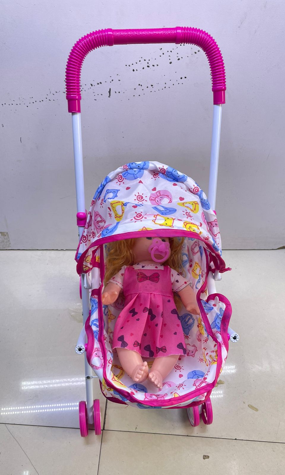 New🔥 🔥 🔥 🔥 Doll plus A Stroller🔥 🔥 🔥 🔥
30cm doll
52cm Stroller
Comes with Toilet  Training Potty, Diaper and Feeding Bottle
The doll is able to drink 
The doll makes crying Soounds
