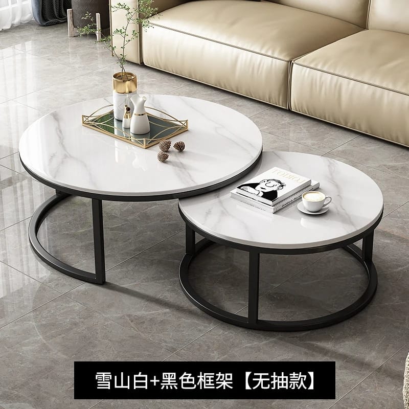 Modern Luxury 2in1 pure  Marble Nesting tables  Crafted from genuine marble and supported by a strong metallic frame, this Nordic-inspired design adds a touch of modern luxury to any living space.